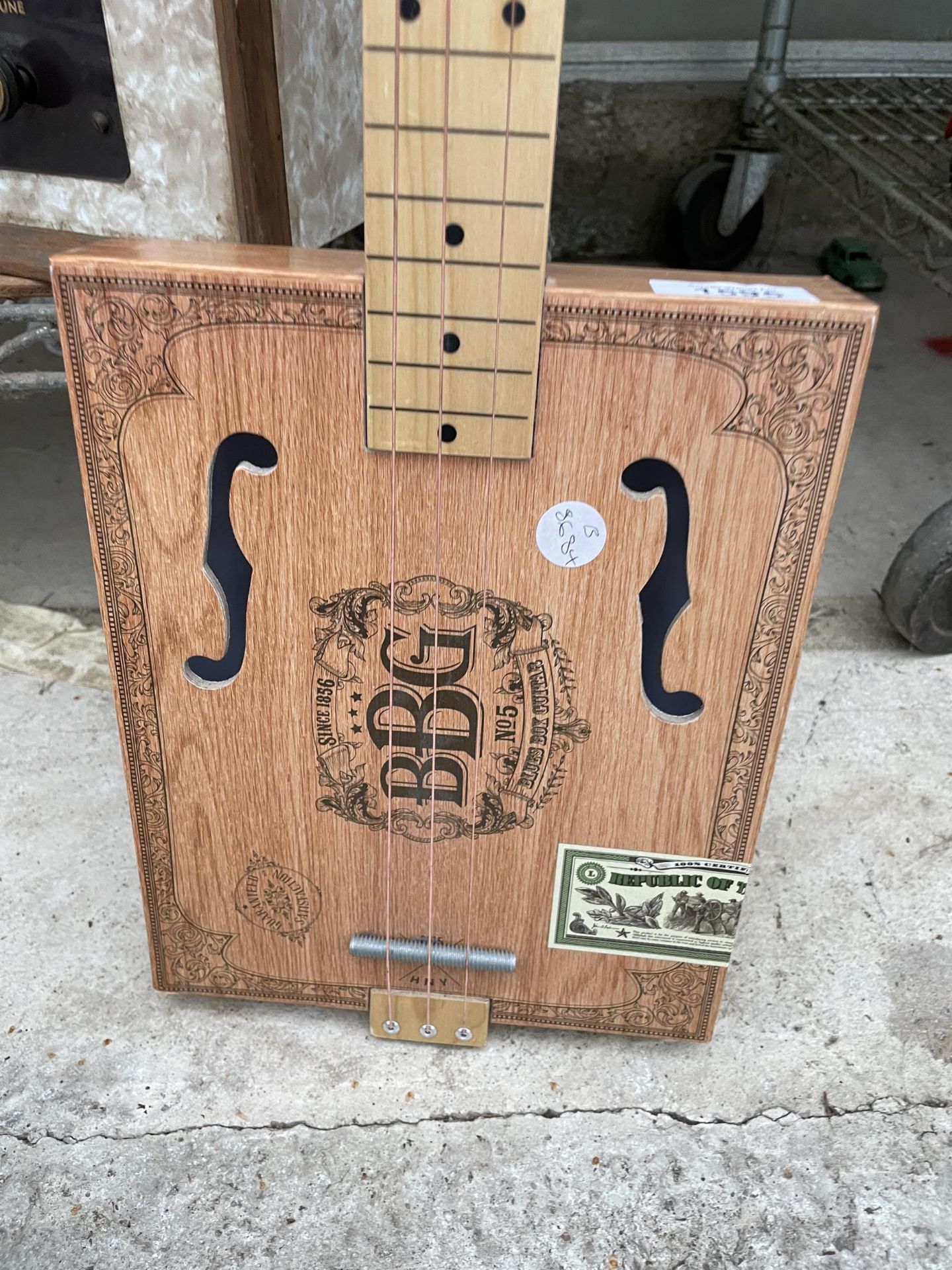 A SCRATCH BUILT THREE STRING INSTRUMENT FORMED FROM A CIGAR BOX - Image 2 of 3