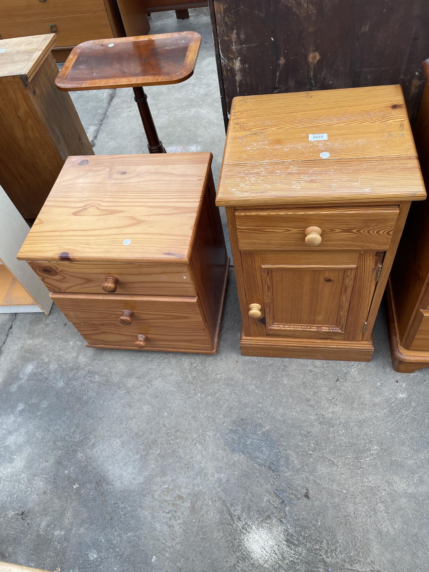 A PINE BEDSIDE CHEST AND A PINE BEDSIDE CABINET