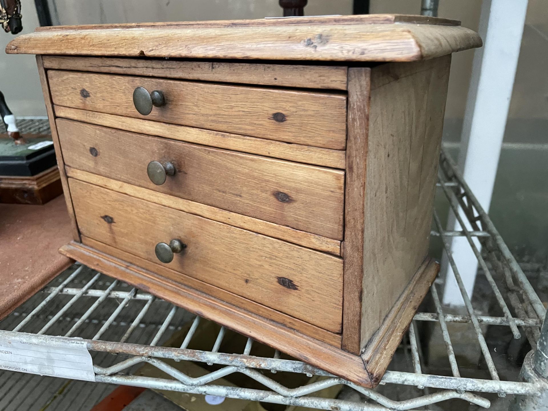 A VINTAGE PINE APPRENTICE CHEST OF THREE DRAWERS WITH SECRET LOCK - Image 2 of 4