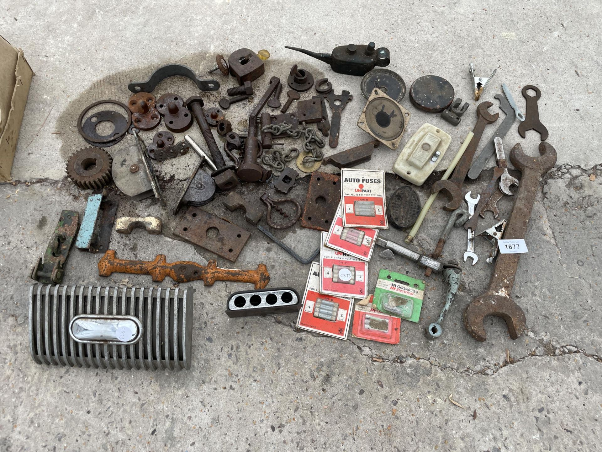 AN ASSORTMENT OF HARDWARE TO INCLUDE BRACKETS AND SPANNERS ETC