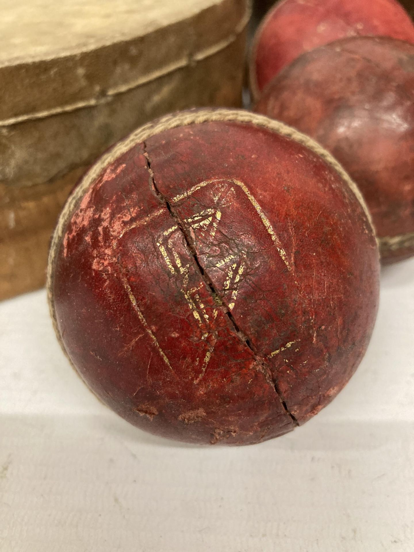 A COLLECTION OF VINTAGE SPORTING ITEMS, SPALDING RUGBY BALL, CRICKET BALLS AND A TAMBORINE - Image 2 of 5