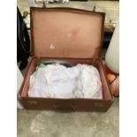A VINTAGE TRAVEL CASE AND A LARGE QUANTITY OF VINTAGE LACE AND LINEN ETC