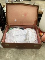 A VINTAGE TRAVEL CASE AND A LARGE QUANTITY OF VINTAGE LACE AND LINEN ETC