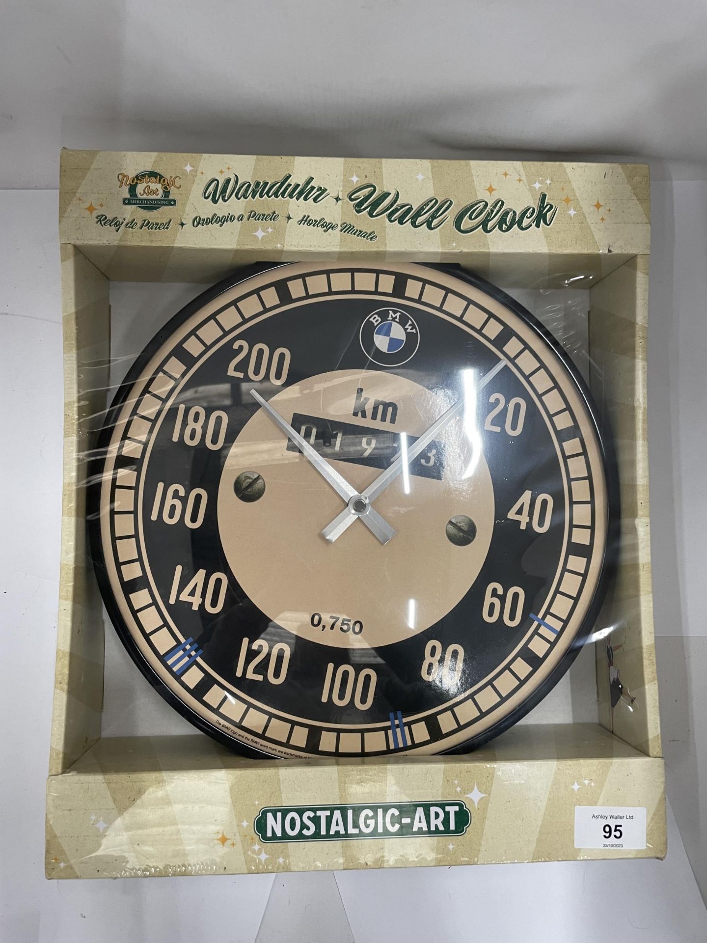 A NEW AND BOXED BMW WALL CLOCK