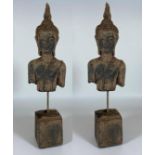 A PAIR OF DECORATIVE STONE BUDDHAS ON PLINTH BASES, HEIGHT 39 CM