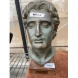 A RESIN BUST OF ALEXANDER THE GREAT ON A WOODEN PLINTH