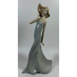A ROYAL DOULTON REFLECTIONS 'WINDSWEPT' LADY FIGURE, HEIGHT 31CM