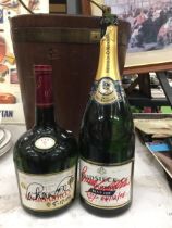 TWO SIGNED BOTTLES TO INCLUDE COURVOISIER AND EMPTY MAGNUM OF CHAMPAGNE