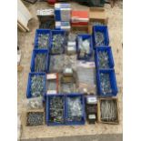 A LARGE ASSORTMENT OF HARDWARE TO INCLUDE BOLTS AND NAILS ETC