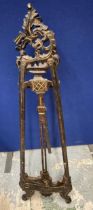 AN ORNATE CARVED PICTURE EASEL