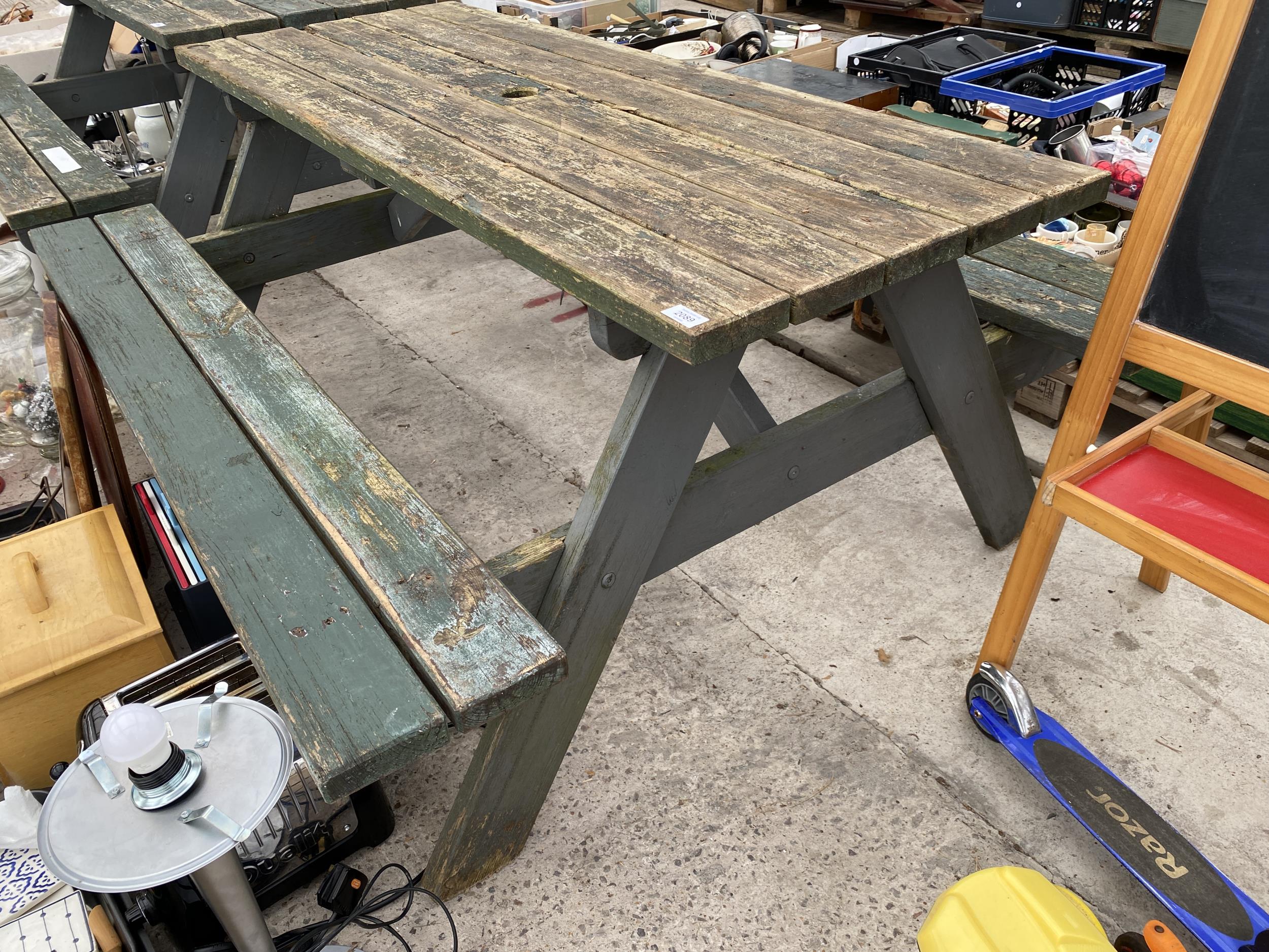 A WOODEN PICNIC BENCH