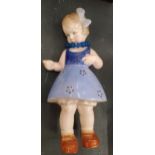 A GOLDSCHNEIDER STYLE CERAMIC FIGURE OF A GIRL - A/F