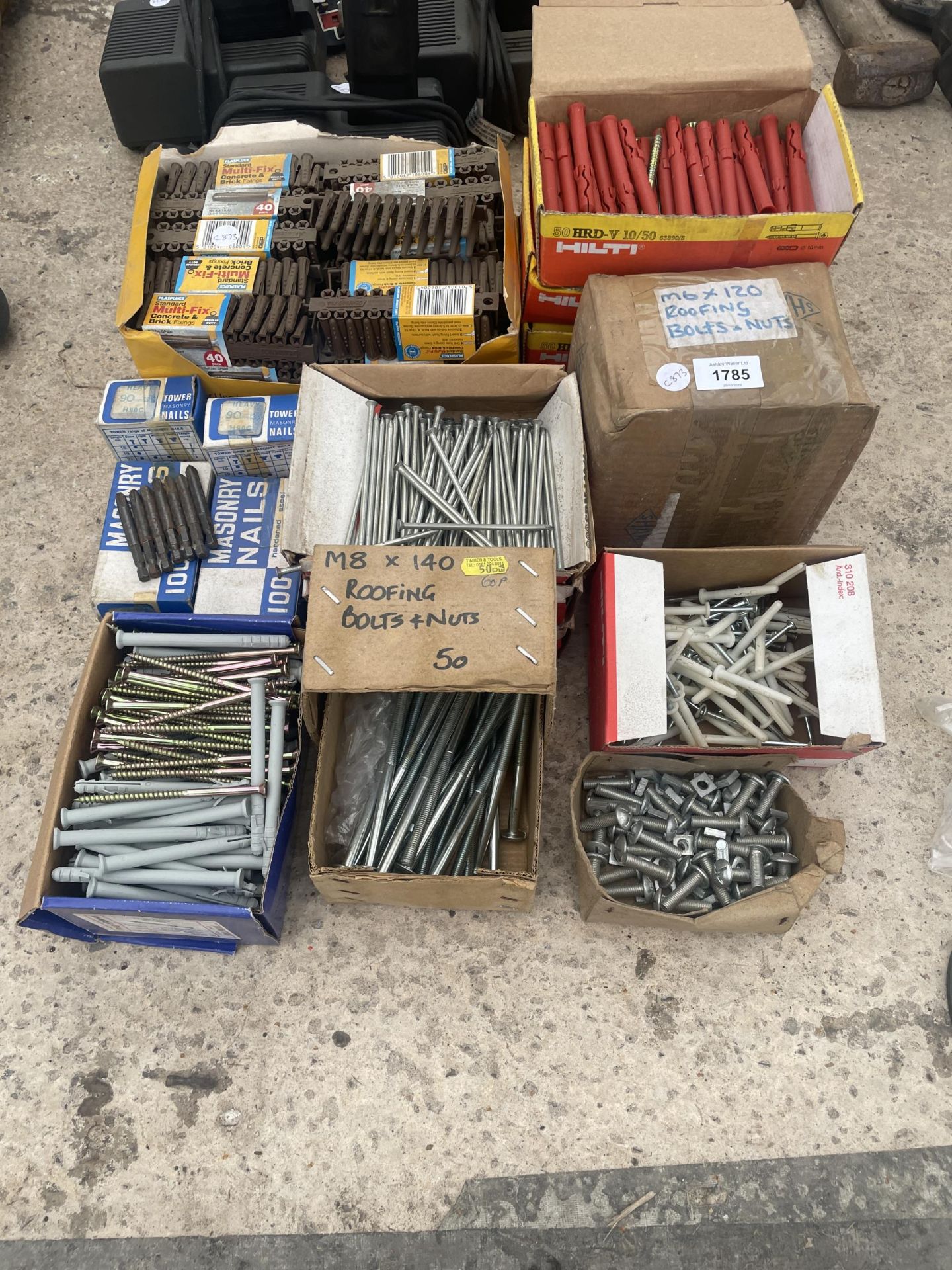 A LARGE ASSORTMENT OF HARDWARE TO INCLUDE SCREWS AND BOLTS ETC