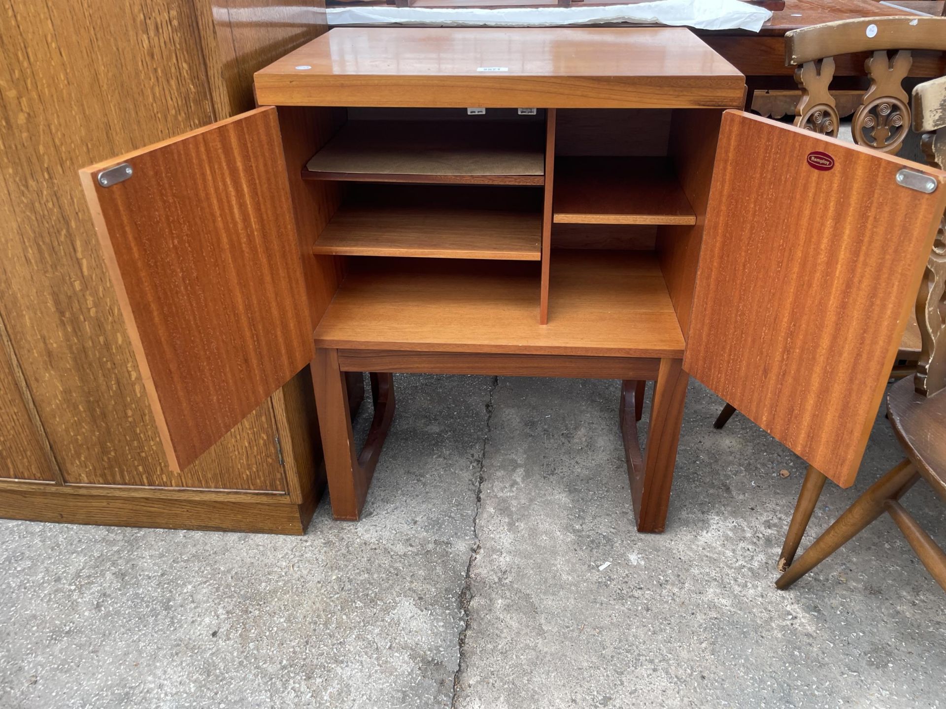 A RETRO TEAK REMPLOY TWO DOOR CABINET ON OPEN BASE, 23.5" WIDE - Image 3 of 4