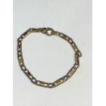 A 9 CARAT GOLD BRACELET