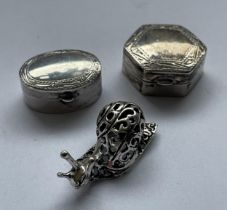 THREE SILVER ITEMS - TWO .925 SILVER PILL BOXES AND A SILVER PIERCED SNAIL ANIMAL MODEL