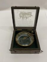 A BOXED BRASS MAP READER AND MAGNIFYING GLASS