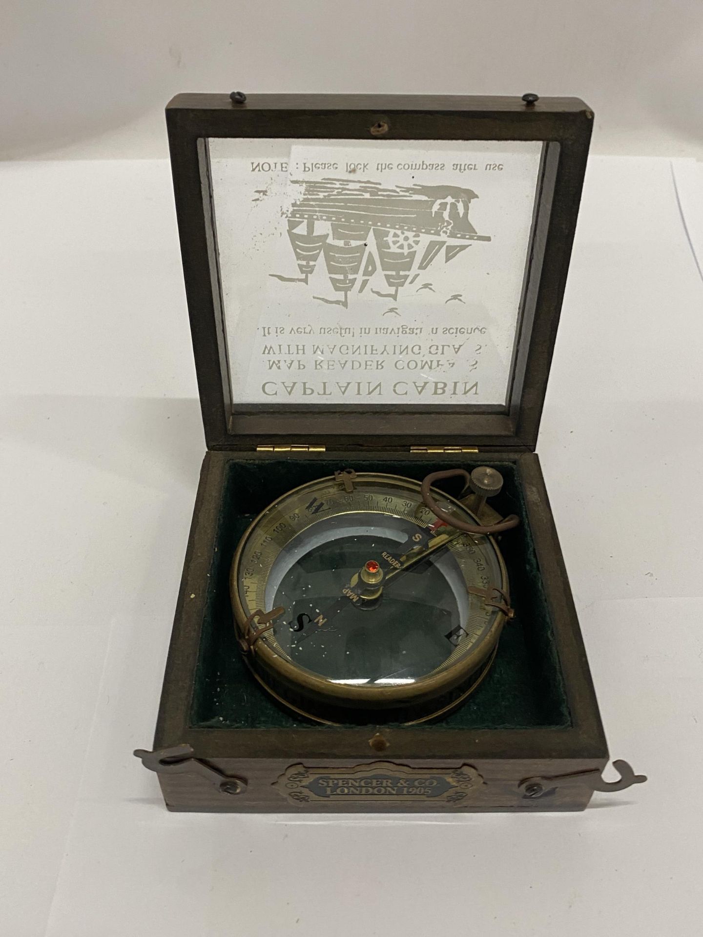 A BOXED BRASS MAP READER AND MAGNIFYING GLASS
