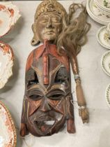 TWO VINTAGE AFRICAN TRIBAL MASKS AND WOODEN HANDLED ITEM