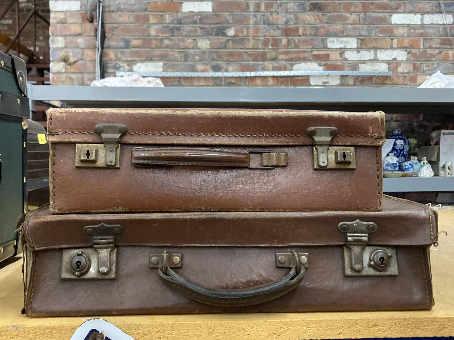 TWO VINTAGE LEATHER EFFECT BRIEFCASES