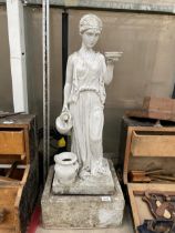 A FIBRE GLASS WATER FEATURE OF A FEMALE WATER CARRIER (H:91CM)