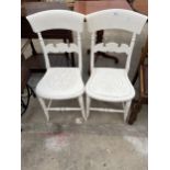 A PAIR OF VICTORIAN WHITE PAINTED BEDROOM CHAIRS