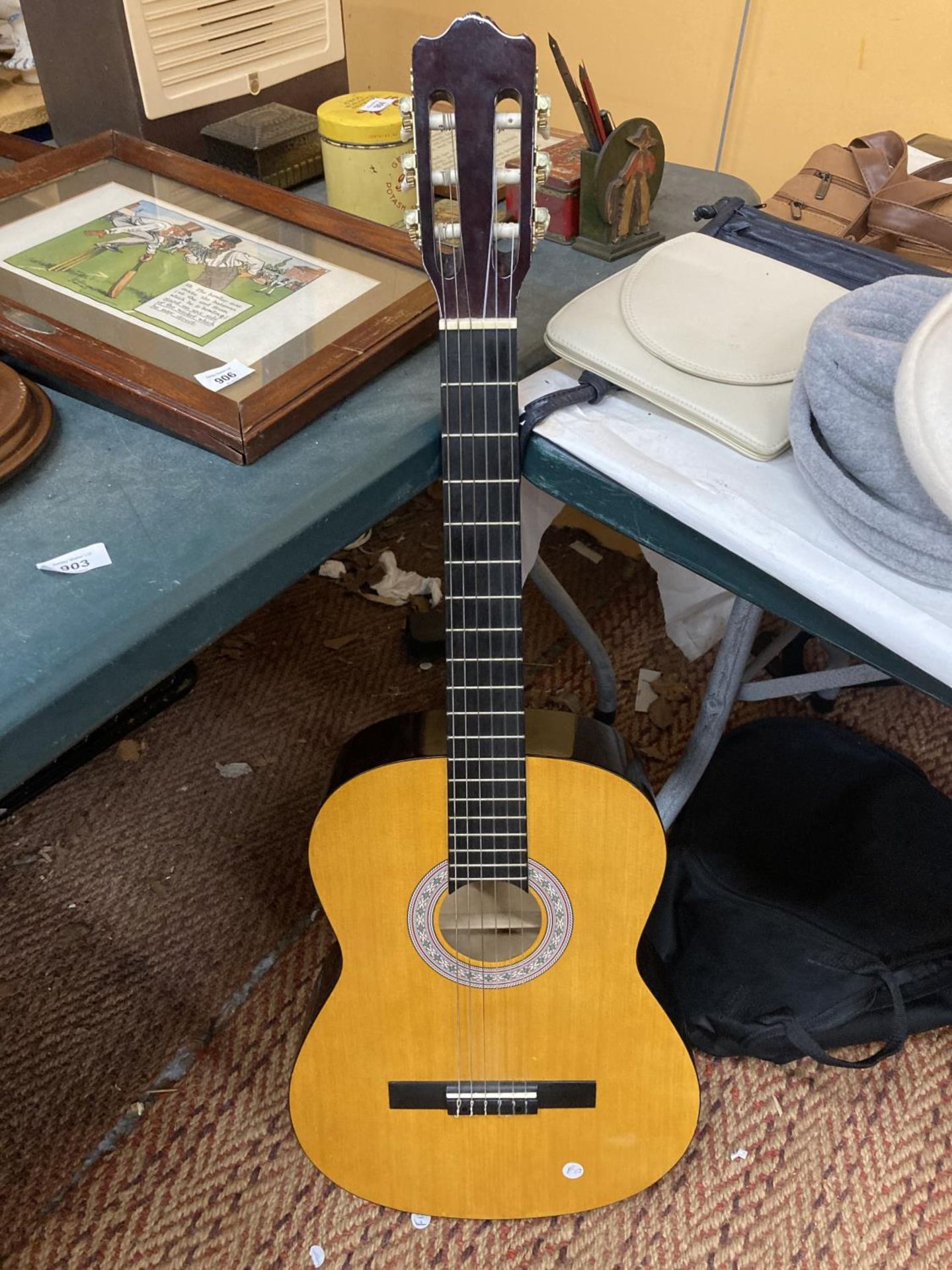 AN ENCORE ACOUSTIC GUITAR WITH CASE