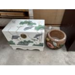 A CARVED HARDWOOD AND PAINTED JARDINIERE AND MINIATURE WHITE AND FLORAL DECORATED CHEST ON STAND,