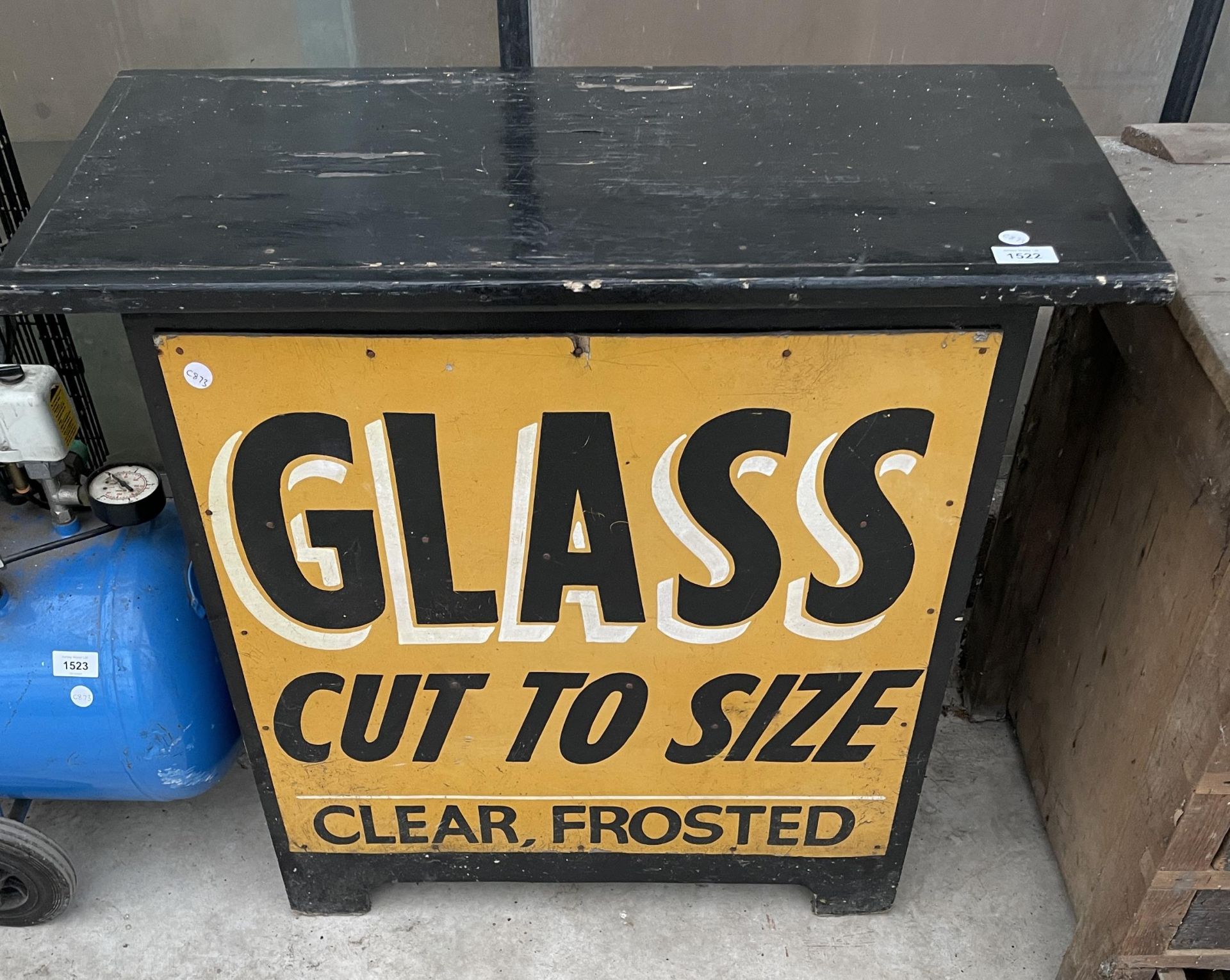 A VINTAGE WOODEN HARDWARE SHOP DOUBLE SIDED SIGN 'GLASS CUT TO SIZE' AND 'OPEN BUILDING MATERIALS