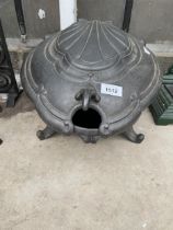 A DECORATIVE LIDDED CAST IRON COAL BUCKET