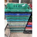 A LARGE ASSORTMENT OF PLASTIC STACKING CRATES