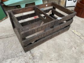 A VINTAGE MONOGRAMED WOODEN CRATE AND A VINTAGE COAL SHOVEL