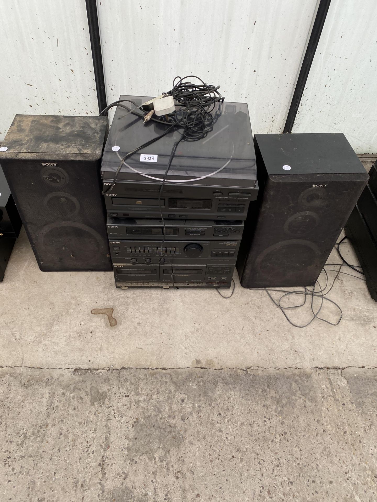 A SONY STEREO SYSTEM WITH A PAIR OF SPEAKERS