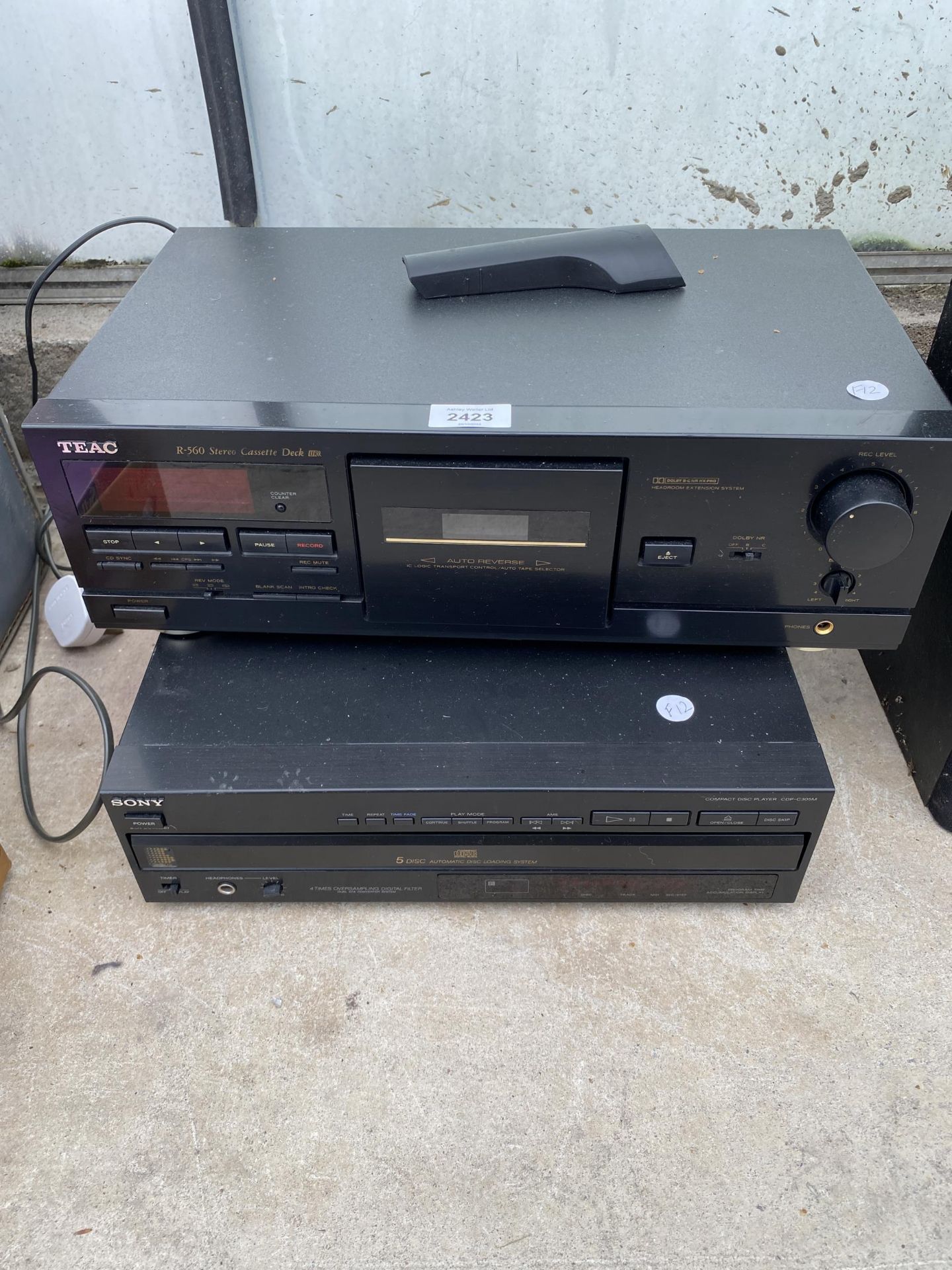 A SONY CD PLAYER AND A TEAK CASSETTE DECK