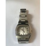 A VINTAGE NIVADA WRIST WATCH WITH ORIGINAL BRACELET. MANUAL SEEN WORKING BUT NO WARRANTY