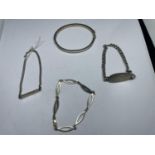 FOUR VARIOUS SILVER BRACELETS TO INCLUDE A CLEAR STONE BANGLE AND TWO IDENTITY BRACELETS WEIGHT 44.3