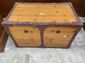 A PINE TUCK BOX WITH METALWARE EFFECT FRAME