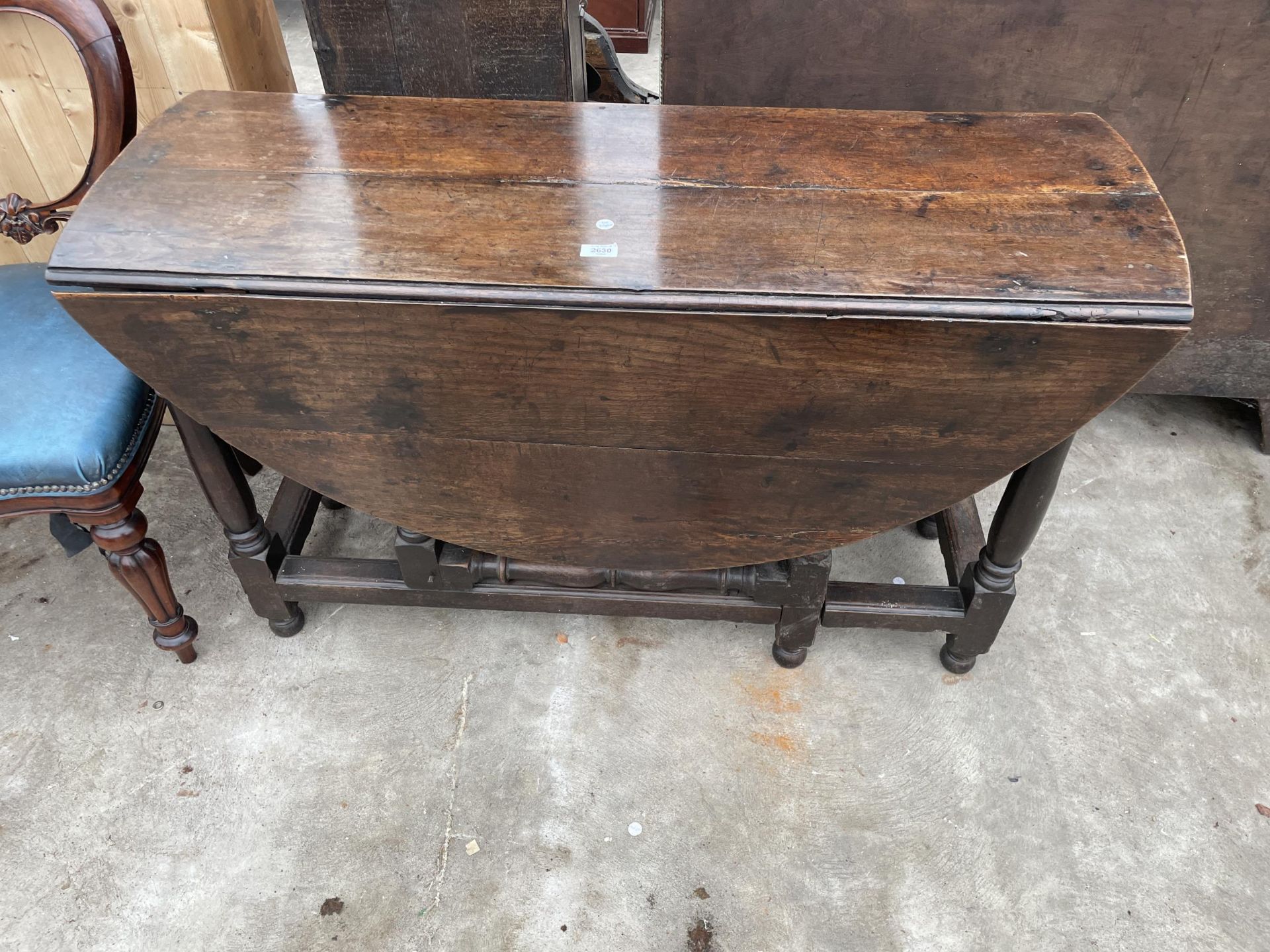AN 18TH CENTURY OAK DINING TABLE ON TURNED LEGS, 50 X 47" OPENED