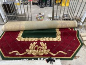 A LARGE OCTAGONAL GREEN, RED AND GOLD 200 OUNCE PURE WOOL RUG, - 423 CM X 271 CM (COST £5000 FROM