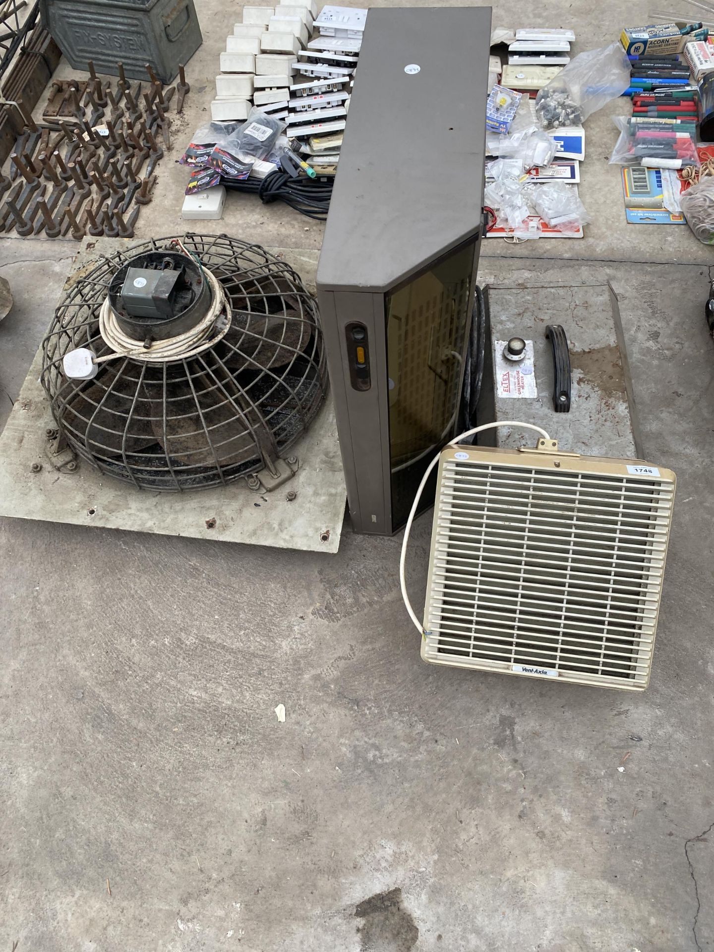 THREE VARIOUS HEATERS AND A FAN