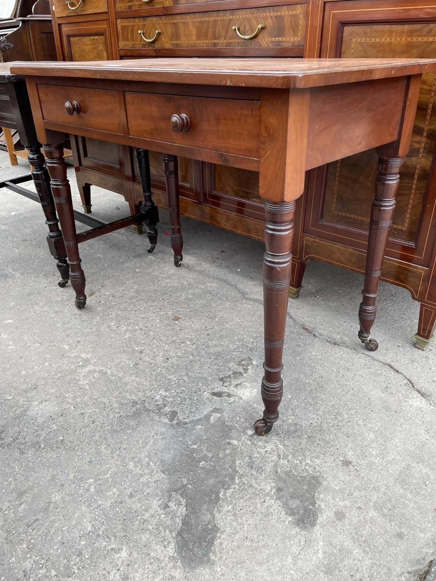 A VICTORIAN MAHOGANY SIDE-TABLE WITH TWO DRAWERS, ON TURNED LEGS, 36" WIDE - Image 2 of 4