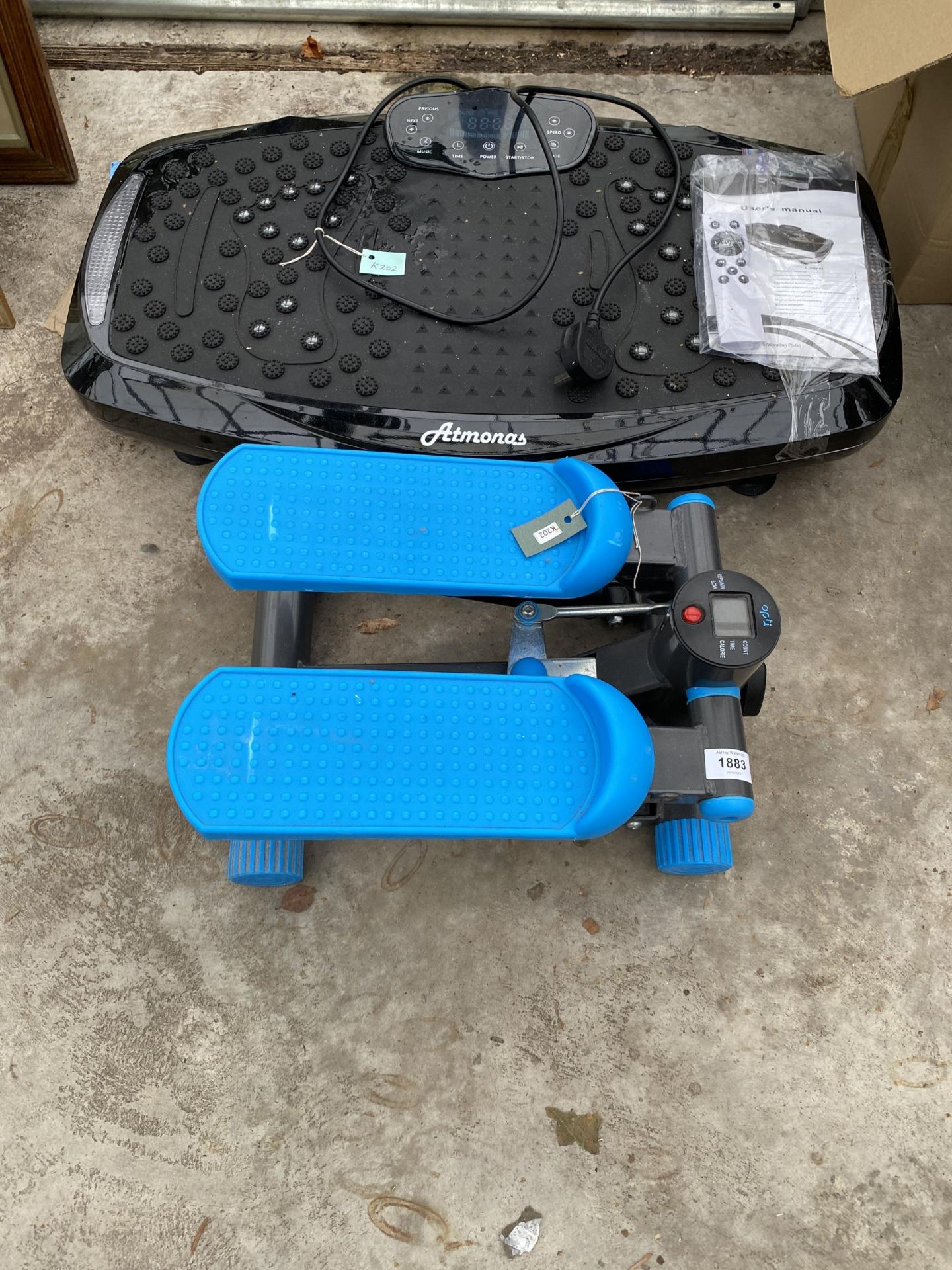A LARGE VIBRATING PLATE EXERCISE MACHINE WITH BUILT IN BLUETOOTH, INSTRUCTIONS, AND REMOTE