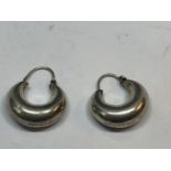 A PAIR OF SILVER HOOP EARRINGS