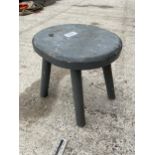 A VINTAGE PAINTED PINE FOUR LEGGED MILKING STOOL