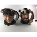 TWO ROYAL DOULTON CHARACTER JUGS - 'THE POACHER' D6429 AND 'TRAPPER' D6609