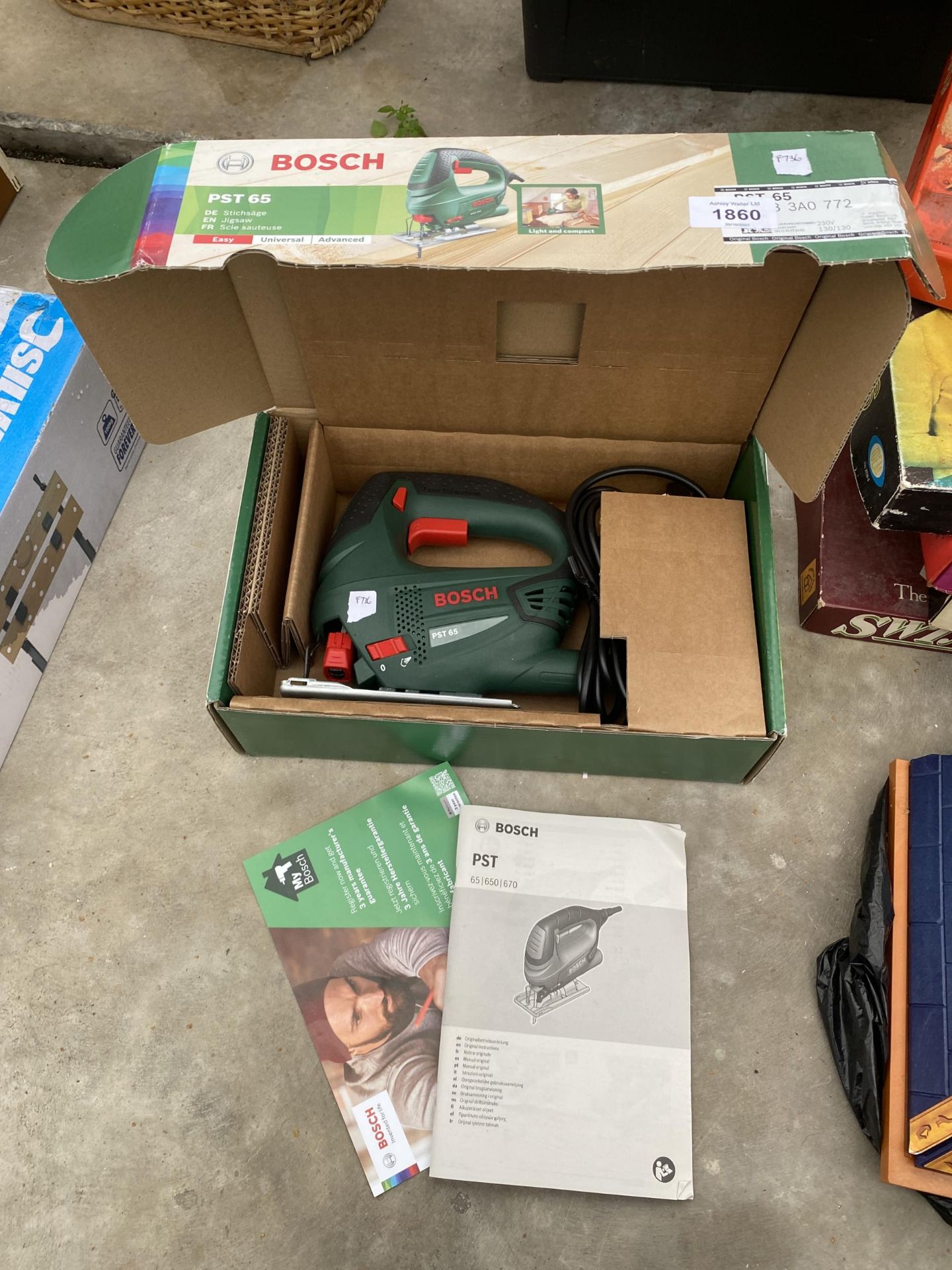 A NEW AND BOXED BOSCH PST65 ELECTRIC JIGSAW