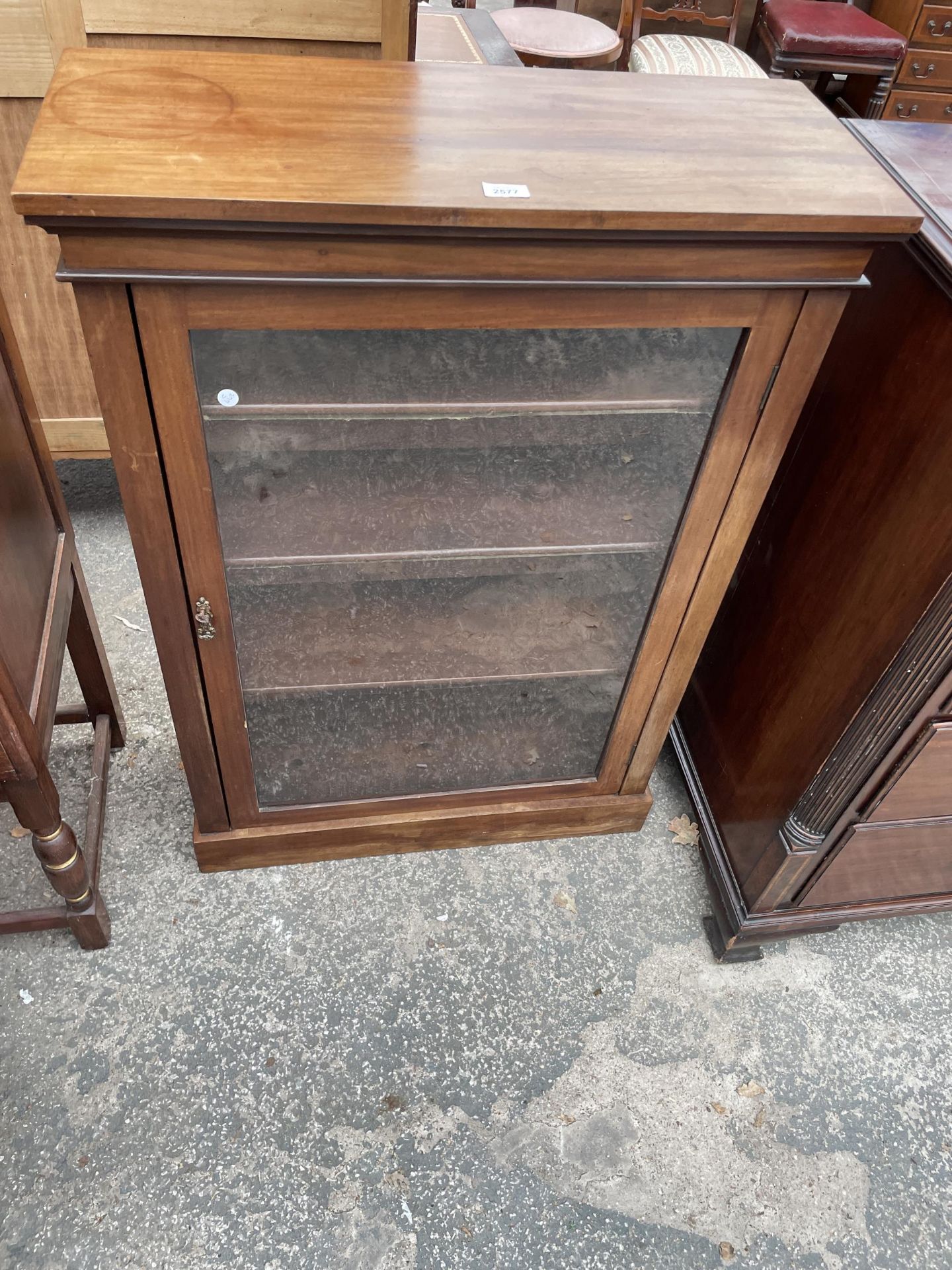 A LATE VICTORIAN MAHOGANY BOOKCASE/PIER CABINET, 30" WIDE