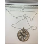 A SILVER MEDALLION AND NECKLACE