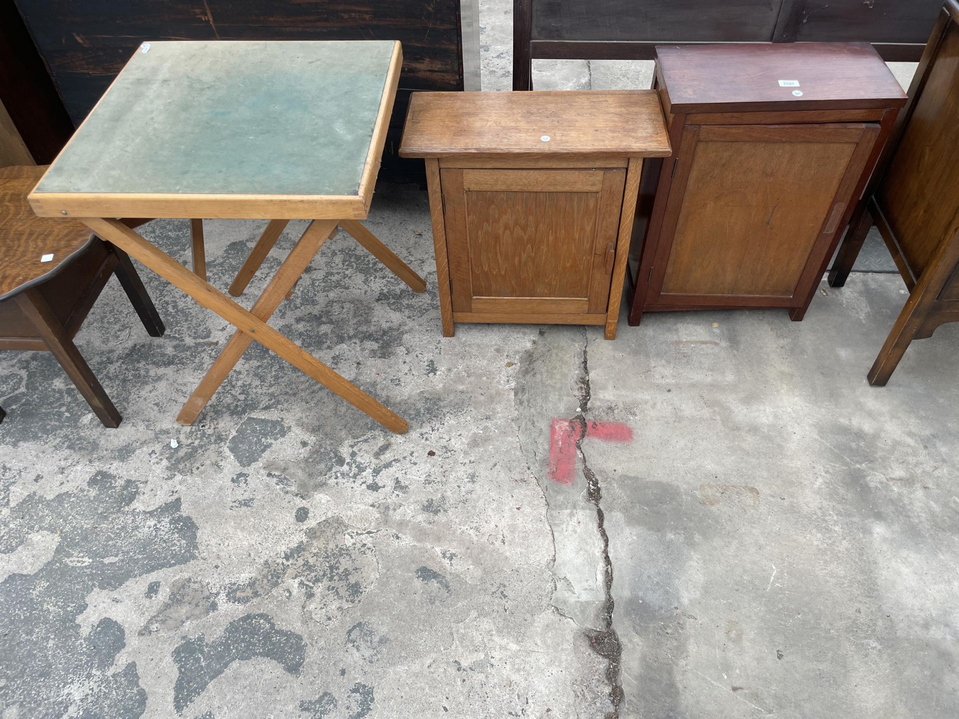 A SMALL OAK CABINET, SIMILAR CABINET AND FOLDING CARD TABLE