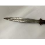 A VINTAGE DAGGER WITH A WOODEN HANDLE